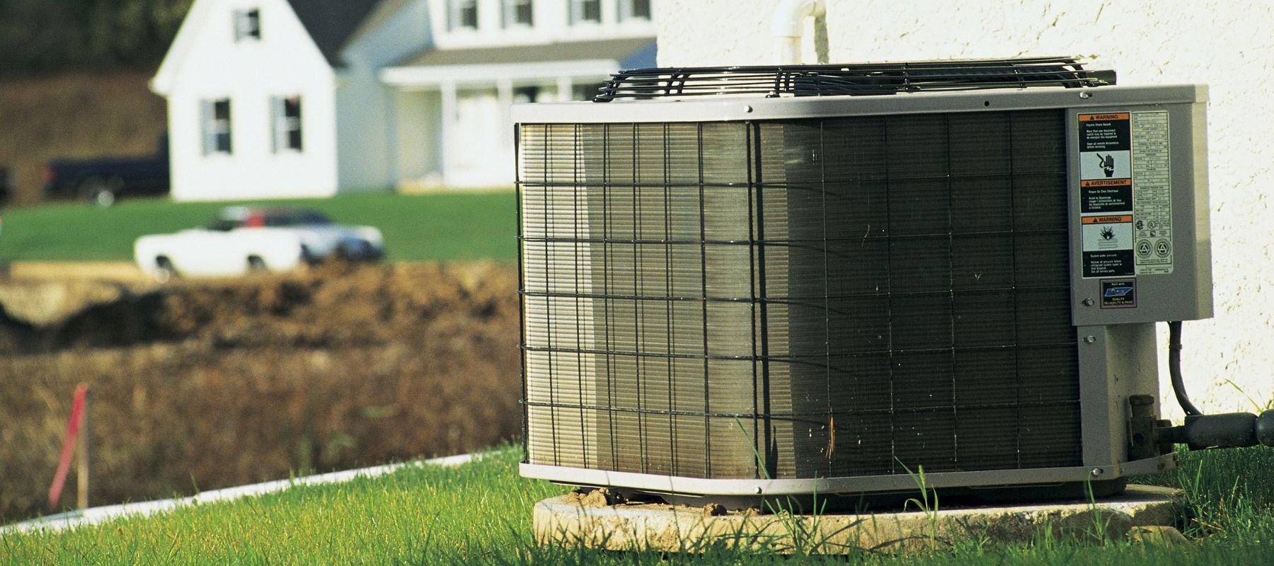 central hvac unit on the side of a Oklahoma home